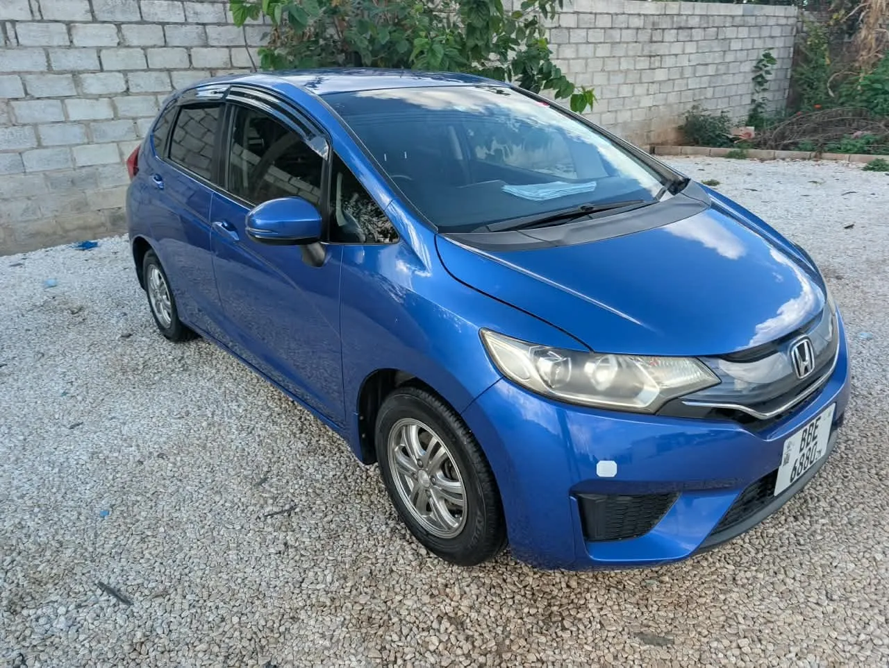 Blue Honda Fit hatchback available for enquiry